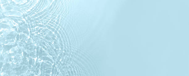 istock Fresh blue rippled water. Summer water surface background. 1475505811