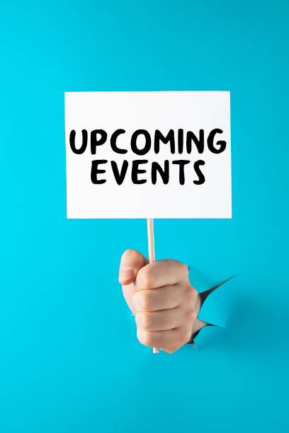 istock Hand Holding Upcoming Events Message 1475516002