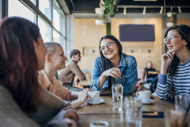 istock Friends in cafe 1475516389