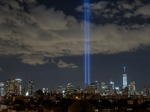 Memorial lights where the World Trade Center was in lower Manhattan, as seen from Brooklyn, NY.