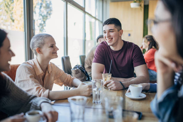 istock Friends sitting in cafe 1475517637