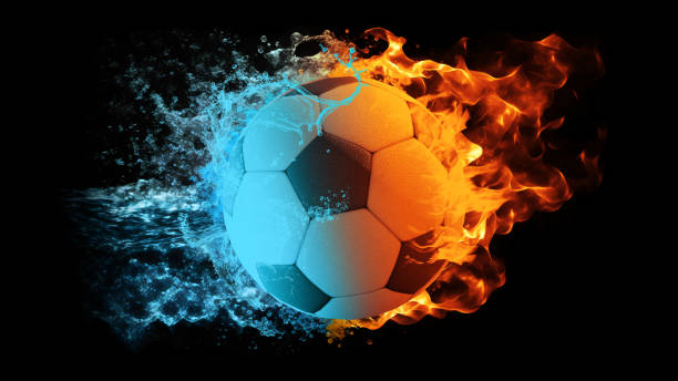 футбольный мяч в огне и воде. футбольный мяч. - water fire circle ball стоковые фото и изображения