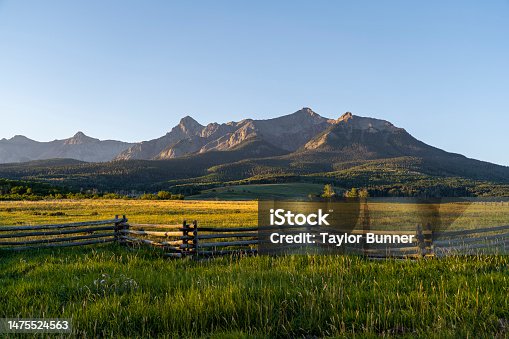 istock Early morning sunrise at the foot of the mountains in Colorado 1475524563