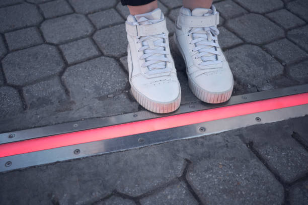 istock Integrated crosswalk stoplight for pedestrians in asphalt. 1475526814