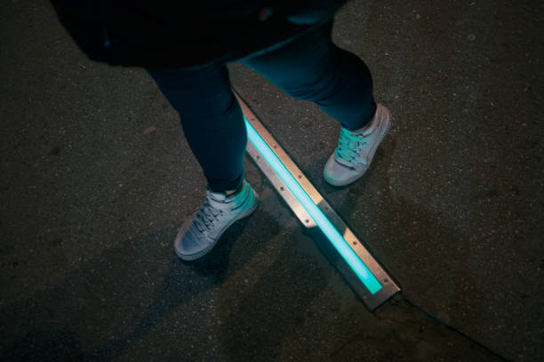 istock Integrated crosswalk stoplight for pedestrians in asphalt. 1475526901