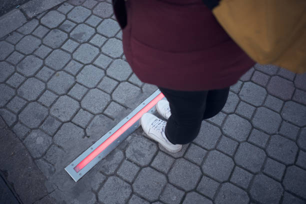 istock Integrated crosswalk stoplight for pedestrians in asphalt. 1475526943