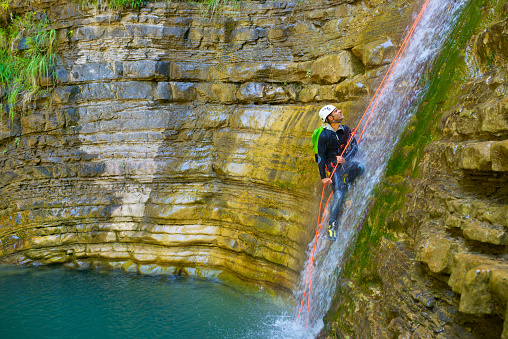 Canyoneering Furco Canyon in Pyrenees, Broto village, Huesca Province in Spain.