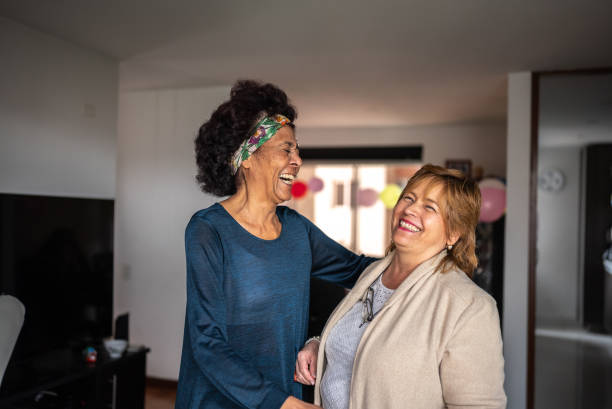 istock Senior friends having fun at home 1475530424