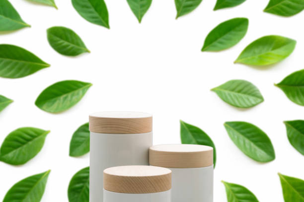 istock Minimal podium tabletop floor outdoors blurred fresh green leaf white background.Organic herbal healthy natural product placement pedestal promotion stand display,tropical nature forest jungle concept. 1475534548