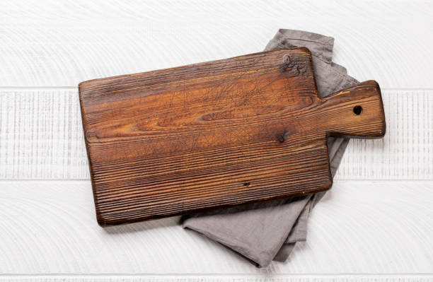 istock Wooden cutting board and kitchen towel 1475539791