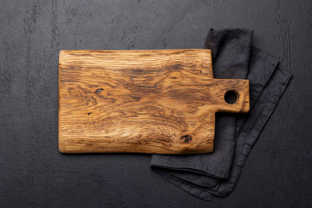 istock Wooden cutting board and kitchen towel 1475540624