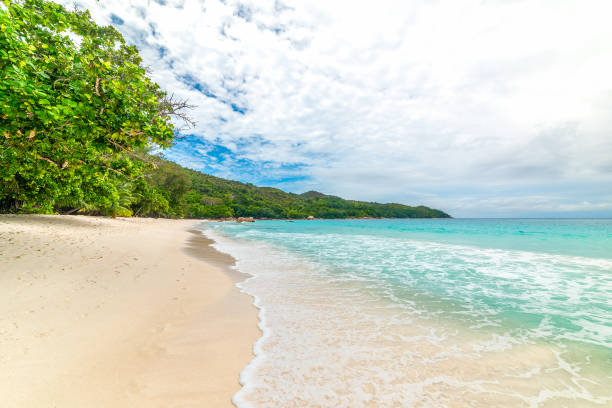 istock Clouds over Anse Lazio beach in Praslin island 1475545188