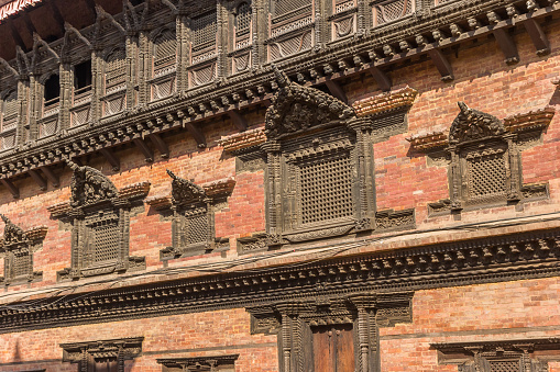 Decorated windows of the 55 Windows Palace at Durbar Square of Bhaktapur, Nepal