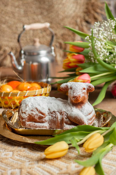 istock Easter Lamb cake with tulips in rustic kitchen for Easter celebrations 1475550446