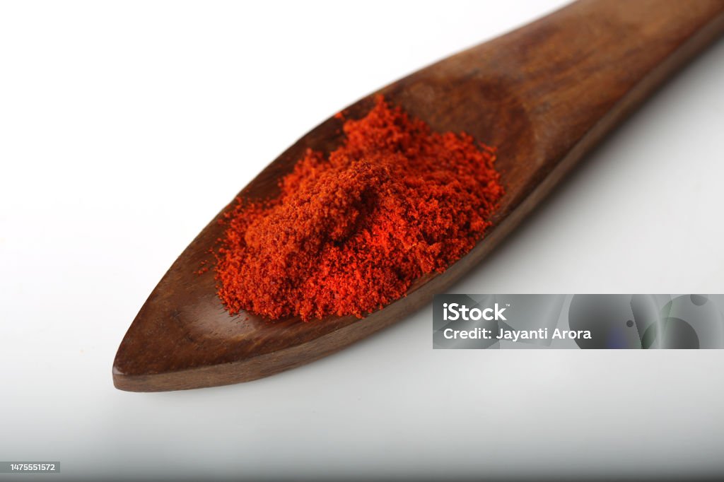 Red Chilli Pepper In Wooden Spoons Asia Stock Photo
