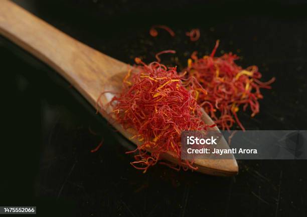 Saffron In Wooden Spoon High Angle Stock Photo - Download Image Now - Close-up, Color Image, Colors