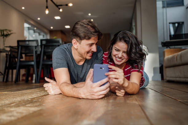istock couple at home 1475556808