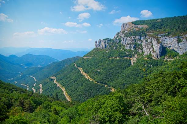 Col de Rousset mountain pass Curvy road in mountain pass Col de Rousset in Vercors Massif, France. drome stock pictures, royalty-free photos & images