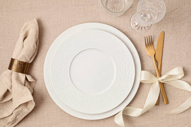 istock Festive wedding, birthday table setting with golden cutlery 1475570513