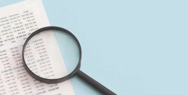 istock Business charts and magnifying glass on table. Financial development, Banking Account, Statistics 1475572295