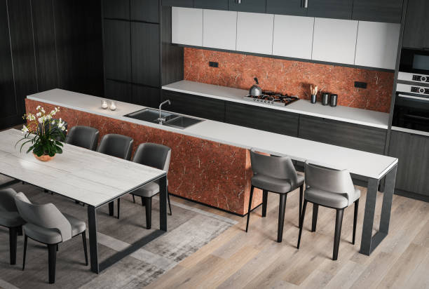istock Modern minimalist kitchen with long island with stools. Oak wood and stone. Orange backsplash color. 1475572429
