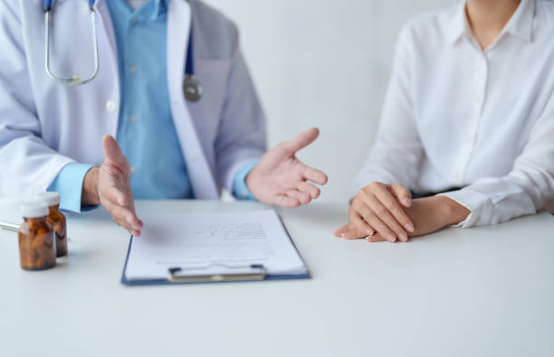 istock Doctor who records a patient's detailed information or medication history is evaluating medications and vaccines for the intended treatment. or if there are any side effects. 1475572432