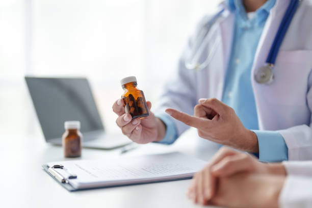 istock Doctor who records a patient's detailed information or medication history is evaluating medications and vaccines for the intended treatment. or if there are any side effects. 1475572459