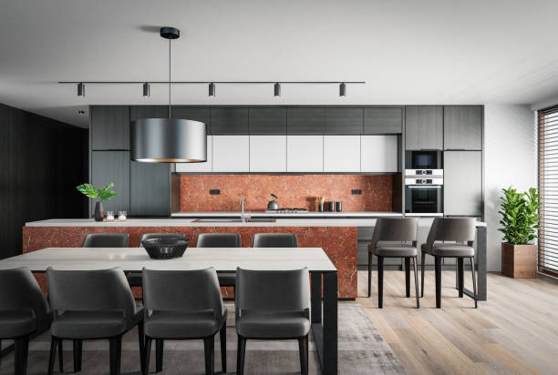 istock Modern minimalist kitchen with long island with stools. Oak wood and stone. Orange backsplash color. 1475572749