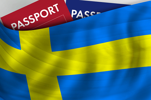 Swedish flag background and passport of Sweden. Citizenship, official legal immigration, visa, business and travel concept.