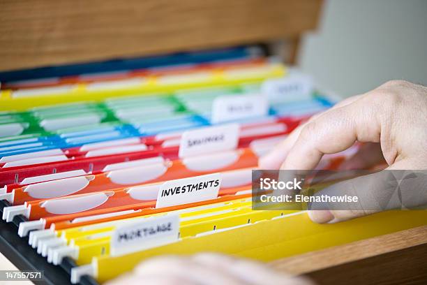 Financial Documents In Folders Stock Photo - Download Image Now - File Folder, Organization, Filing Documents