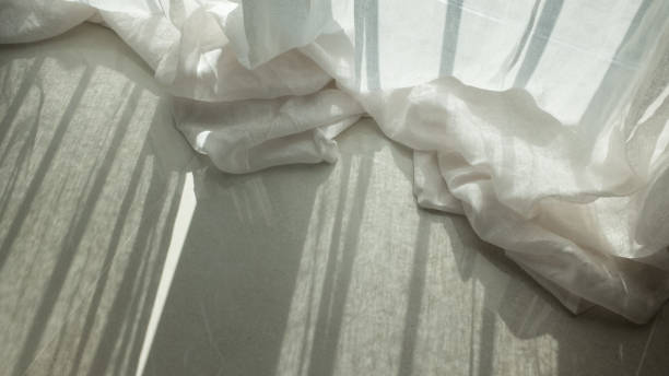 istock Sunlight coming into the room and curtains 1475579107