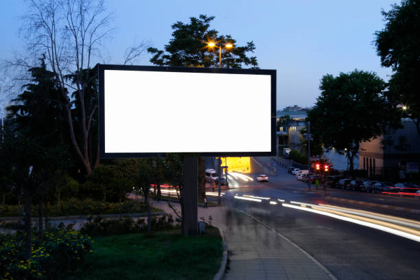 istock Blank billboard in the city traffic,copy space.Advertisement 1475586504