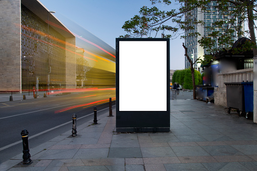 Blank billboard in the city traffic,copy space.Advertisement