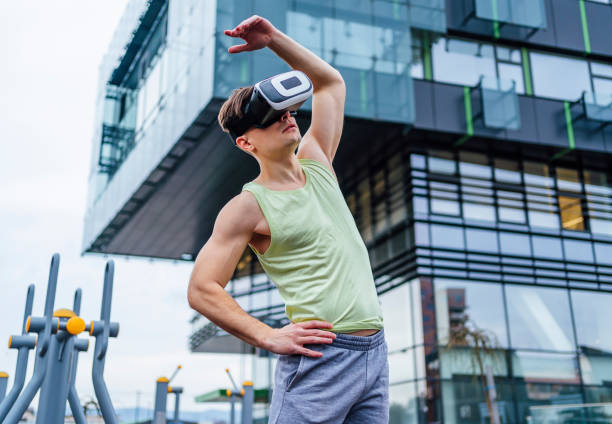 istock Sporty man with virtual reality headset 1475589495