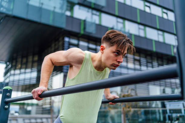 istock Sporty man exercising in a recreational park 1475590770