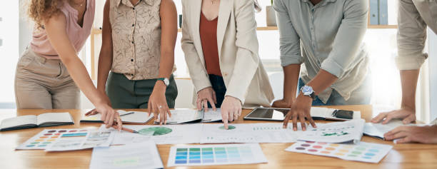 istock Hands, finance and documents with a business team planning in collaboration for growth in an office. Accounting, data and teamwork with a man and woman employee group working on a financial budget 1475594654