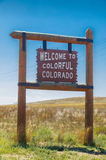 Colorado welcome sign at the Nebraska state line welcoming drivers to the state of Colorado as they drive north on State Highway 71.