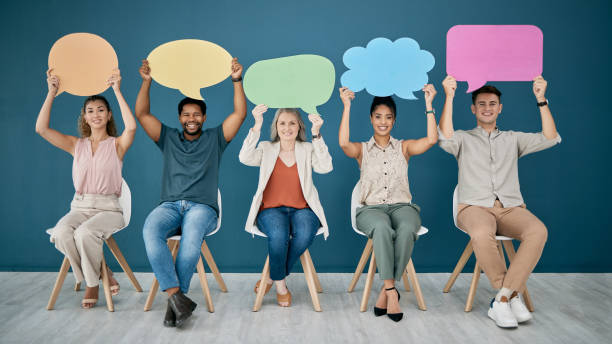 istock Portrait, diversity and business people with speech bubble, communication and job interview. Mockup, multiracial and signs for opinion space, recruitment and creative employees with open discussion 1475596354