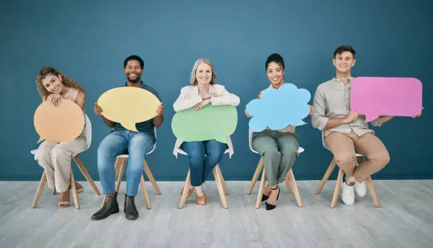 Photo of Speech bubble, social media and business people in waiting room for recruitment or hr survey. Hiring, portrait and group of employees with chat sign for vote, feedback or opinion mock up in office.