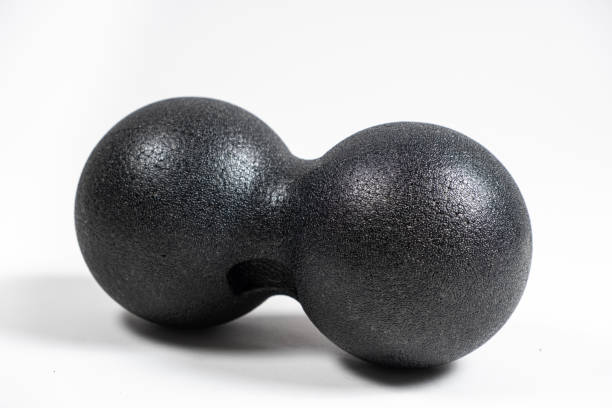 istock Double back massage ball, myofascial release, back muscle relaxation, self-massage. 1475598716