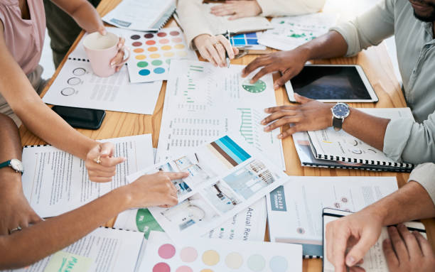 istock Hands, financial and documents with a business team planning in collaboration for growth in an office. Accounting, data and teamwork with a man and woman employee group working on a finance budget 1475598828