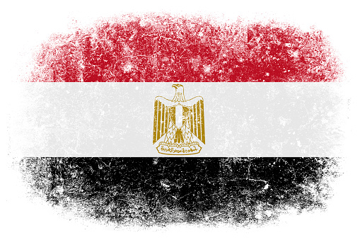 Grunge Egyptian flag on white background.