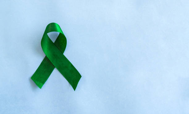 istock Green awareness ribbon with copy space 1475605396
