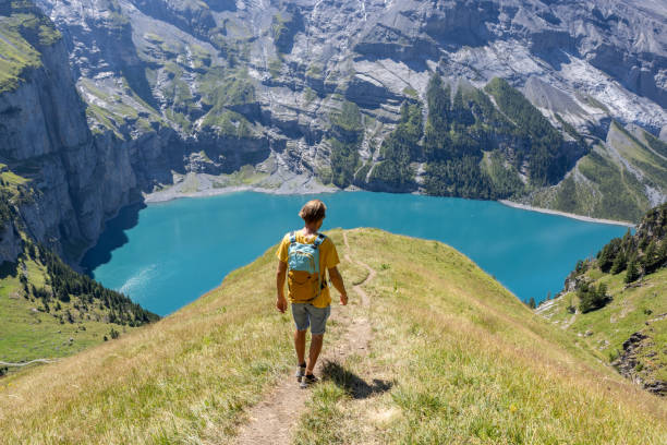 istock Hiker in the mountains, he enjoys nature 1475608390