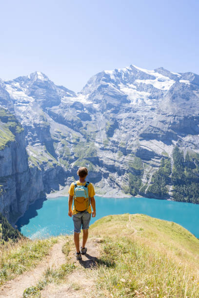istock Hiker in the mountains, he enjoys nature 1475608524