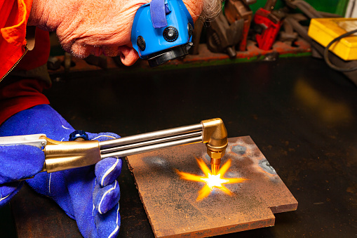 Metal cutter, steel cutting with acetylene torch