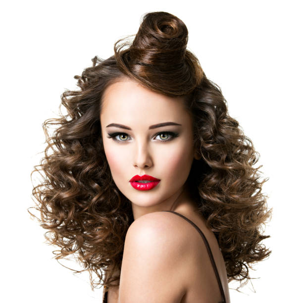 woman portrait with a long curly hair. On white background