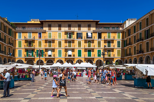Palma de Mallorca, Spain, July 23, 2018; Historic square -Plaza Mayor, with craft market in the old town of Palma de Mallorca.