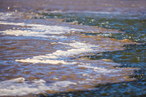 High quality stock photo of Pacific Ocean water meeting fresh water from the Elkhorn Slough in the Monterey Bay.