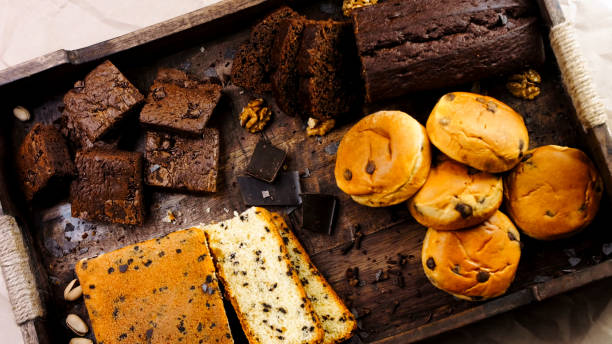 istock Different kinds of cakes arranged on a wooden tray 1475617631